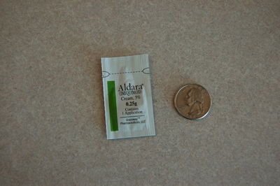 Aldara with quarter