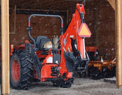 Joshua and Rocky on backhoe